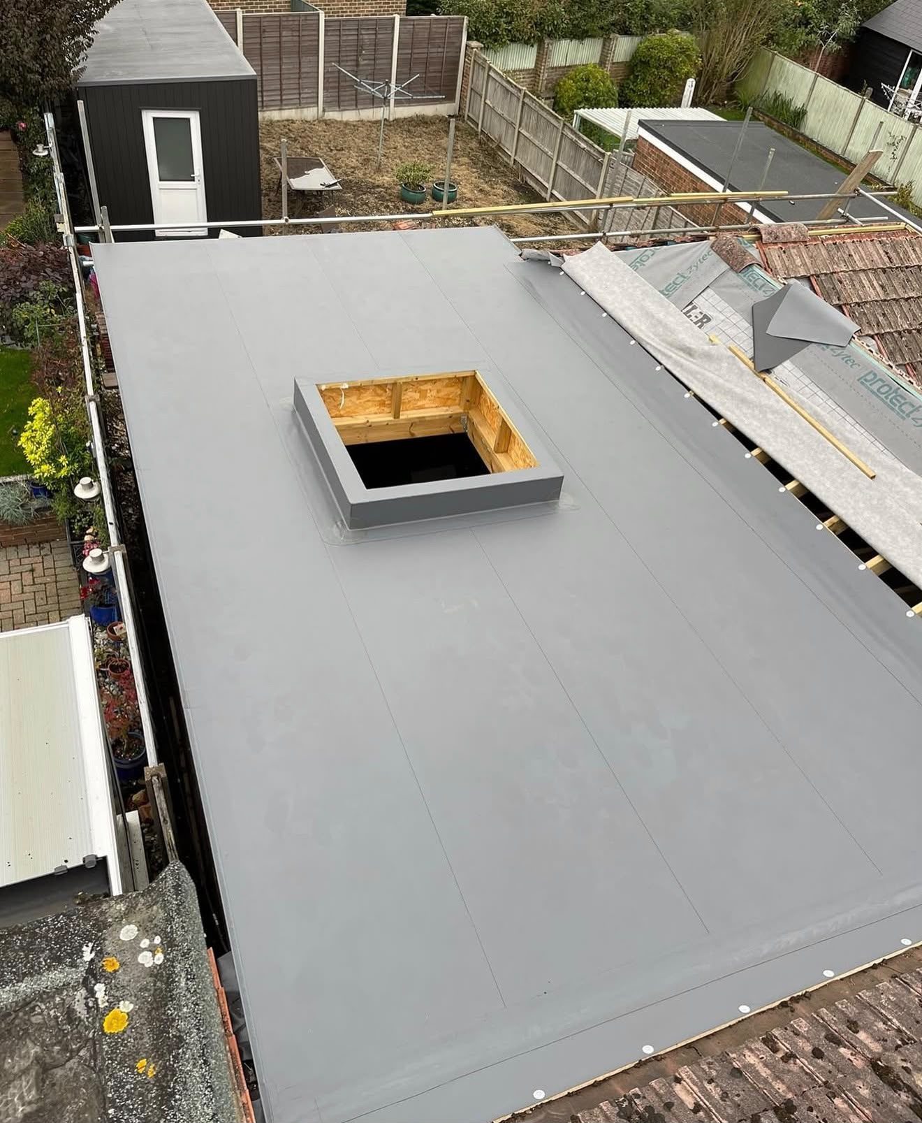 Rooflight kerb formed and weathered into a single-ply flat roof by Platinum Flat Roofing, project photograph 6