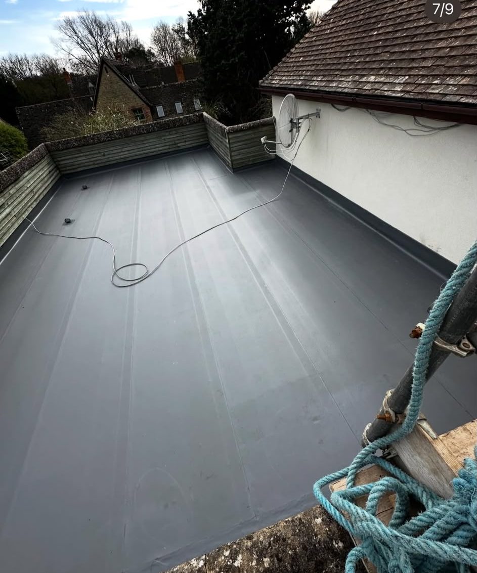Flat roof refurbishment with new grey membrane and corrected edge detailing by Platinum Flat Roofing, project photograph 4