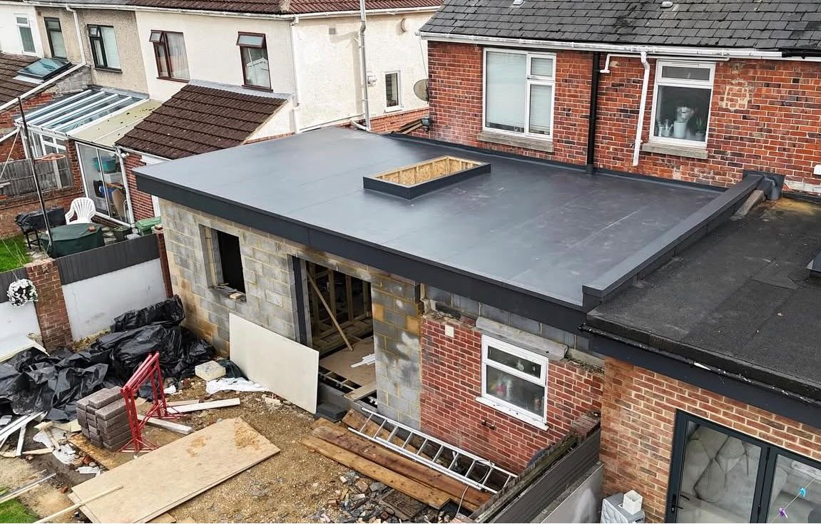 Rooflight kerb formed and weathered into a single-ply flat roof by Platinum Flat Roofing, project photograph 11