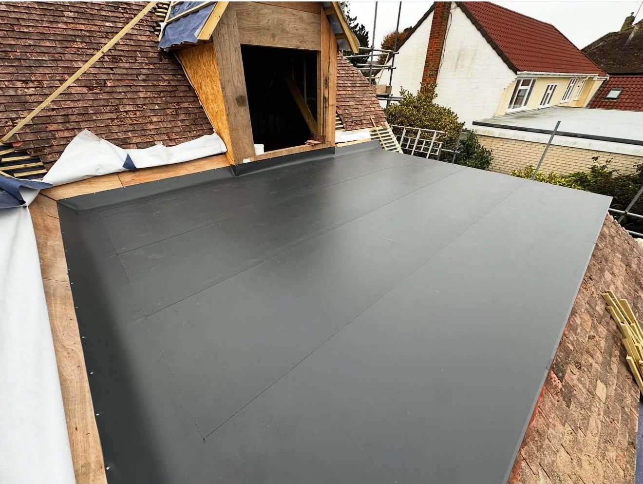 Rooflight kerb formed and weathered into a single-ply flat roof by Platinum Flat Roofing, project photograph 9