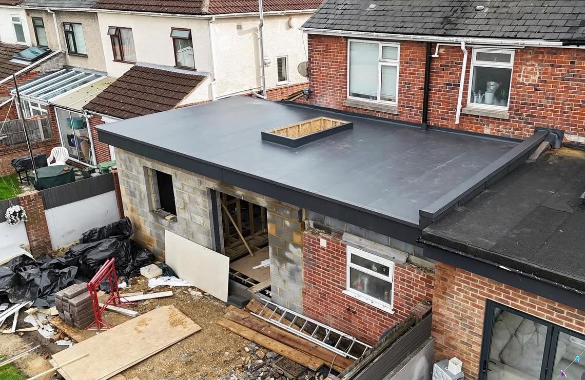 Rooflight kerb formed and weathered into a single-ply flat roof by Platinum Flat Roofing, project photograph 10