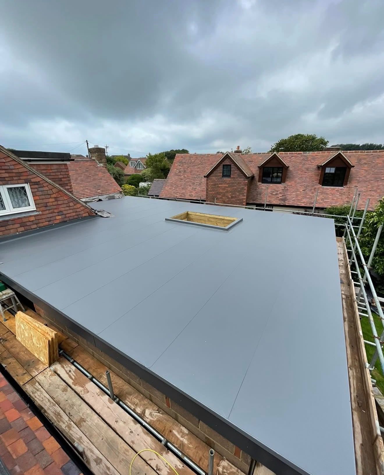 Rooflight kerb formed and weathered into a single-ply flat roof by Platinum Flat Roofing, project photograph 3
