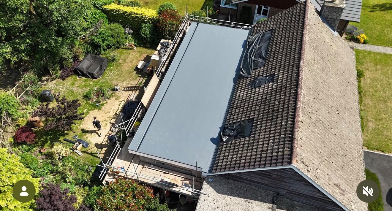 Flat roof refurbishment with new grey membrane and corrected edge detailing by Platinum Flat Roofing, project photograph 2