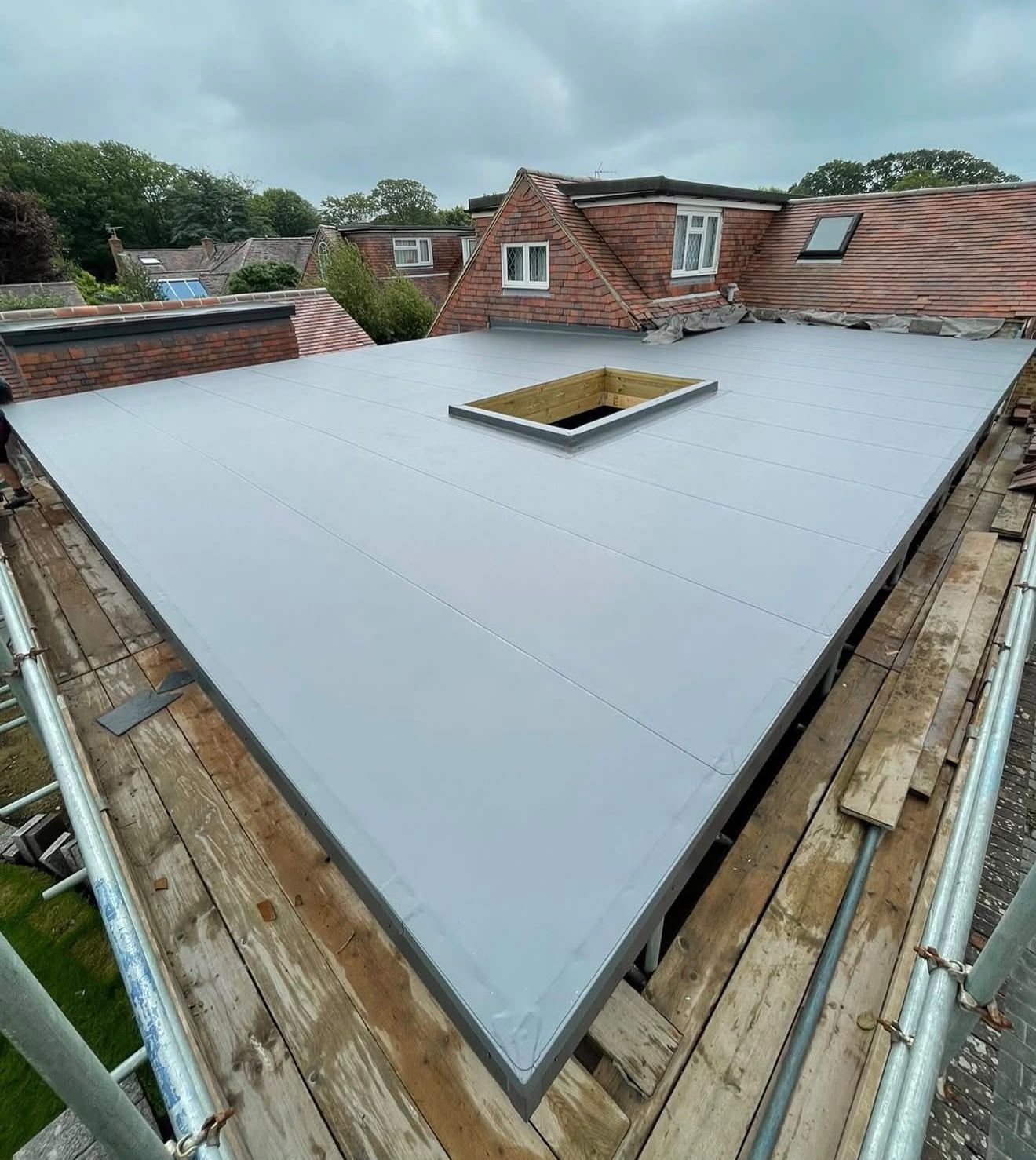 Rooflight kerb formed and weathered into a single-ply flat roof by Platinum Flat Roofing, project photograph 4