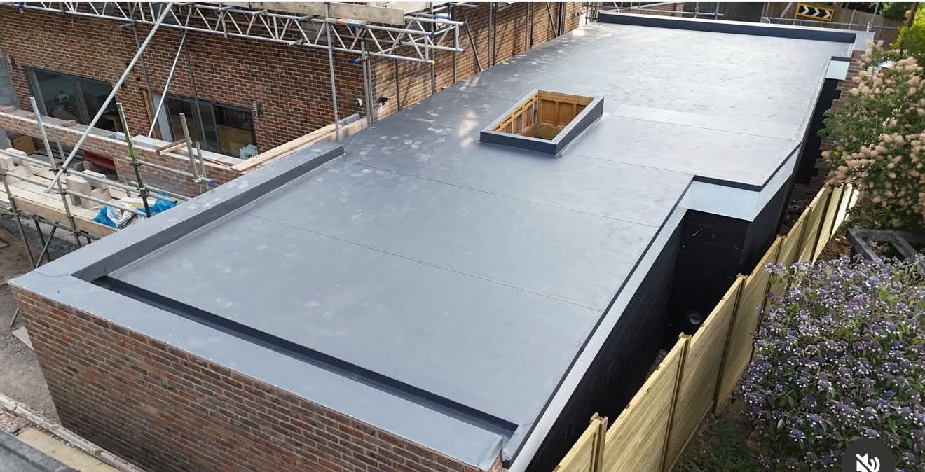 New build extension flat roof with clean welded detailing in Kent
