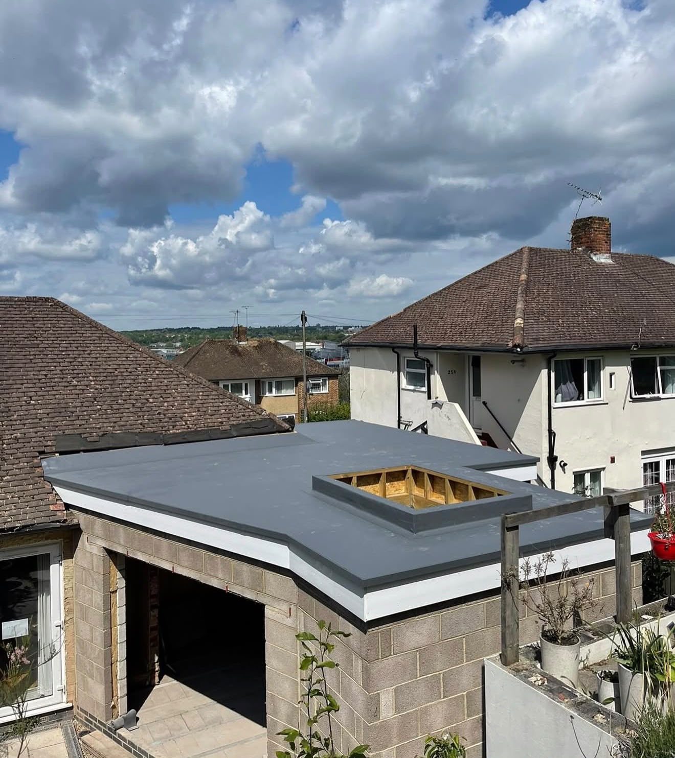 Rooflight kerb formed and weathered into a single-ply flat roof by Platinum Flat Roofing, project photograph 1